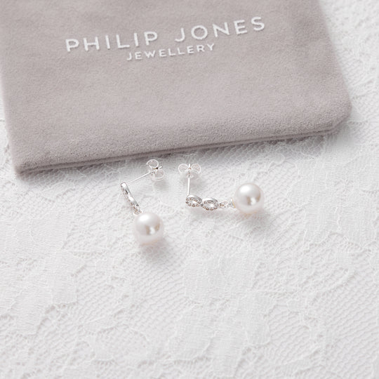 Silver Plated Infinity Pearl Drop Bridal Earrings Created with Zircondia® Crystals