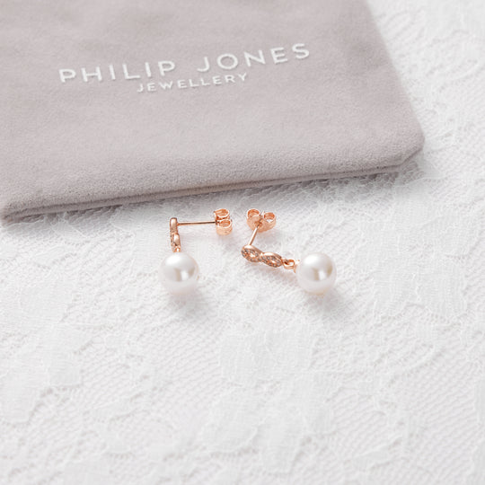 Rose Gold Plated Infinity Pearl Drop Bridal Earrings Created with Zircondia® Crystals