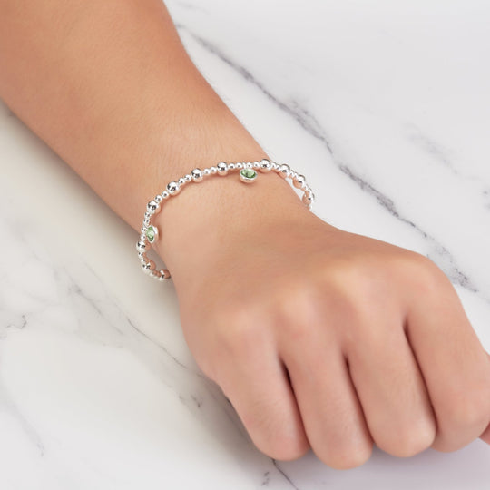 August (Peridot) Birthstone Stretch Charm Bracelet with Quote Gift Box - Philip Jones Jewellery