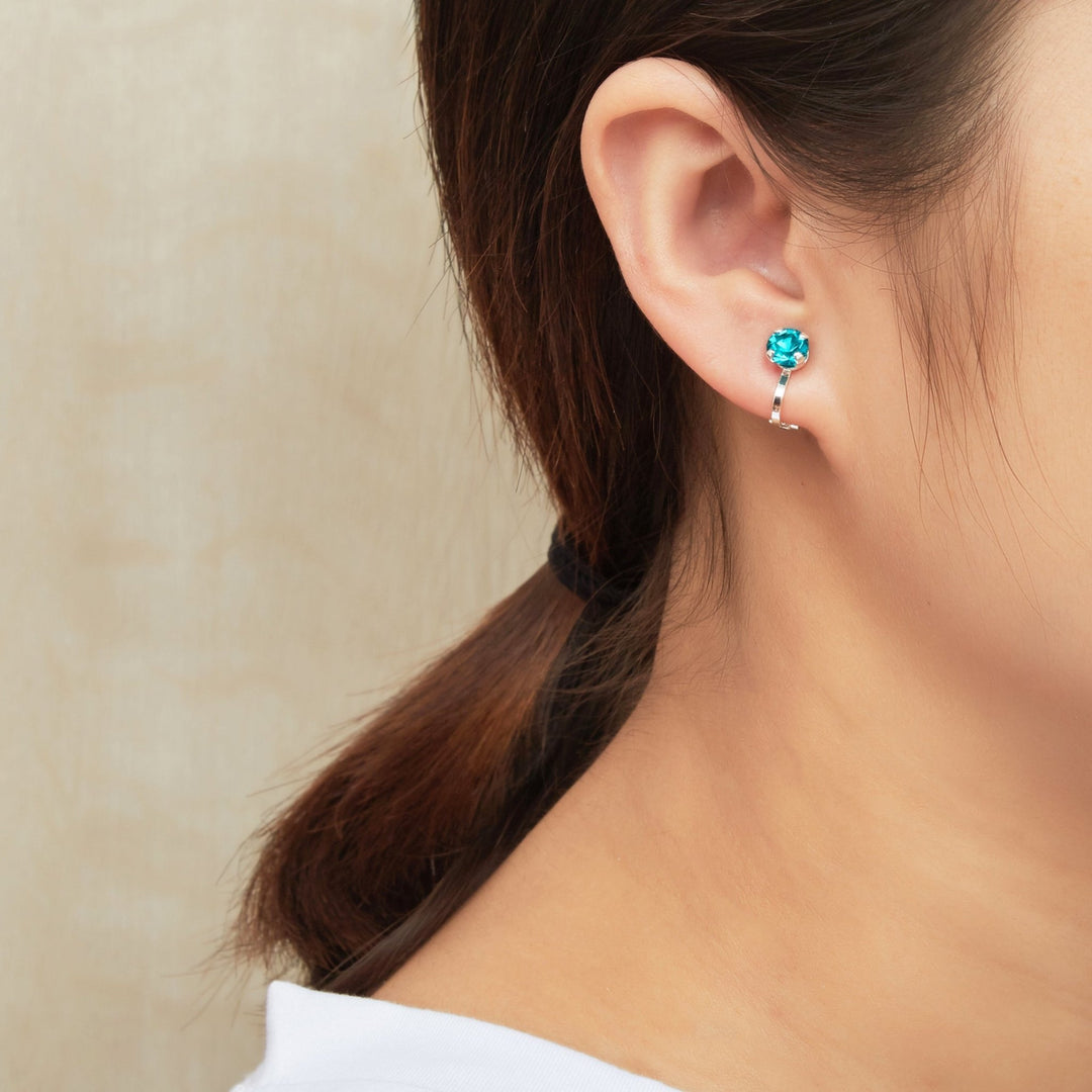 Blue Crystal Clip On Earrings Created with Zircondia® Crystals - Philip Jones Jewellery