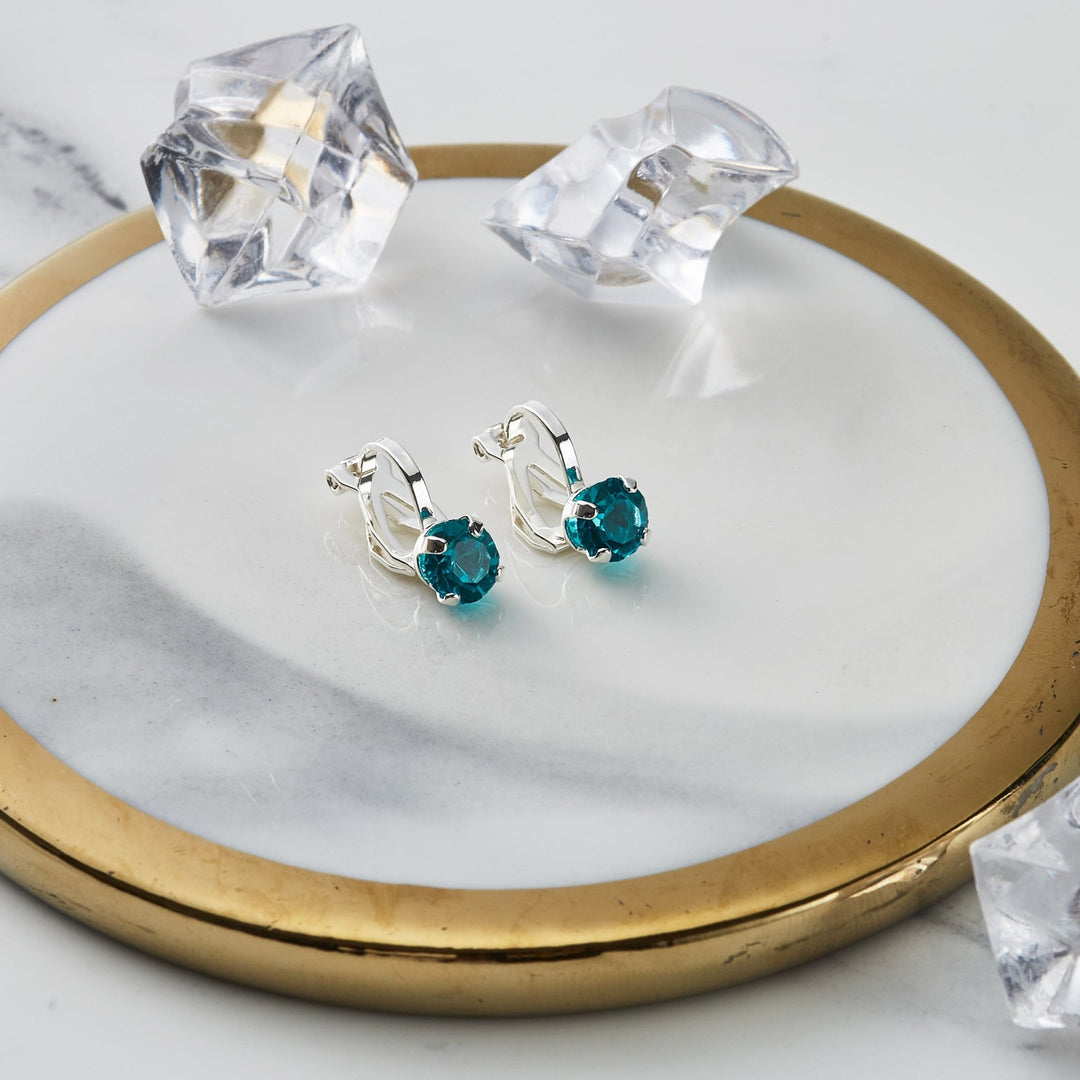 Blue Crystal Clip On Earrings Created with Zircondia® Crystals - Philip Jones Jewellery