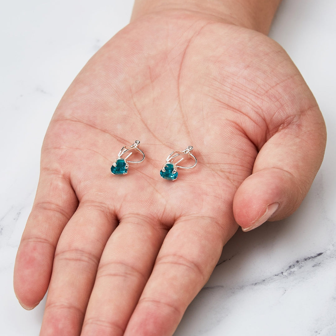 Blue Crystal Clip On Earrings Created with Zircondia® Crystals - Philip Jones Jewellery