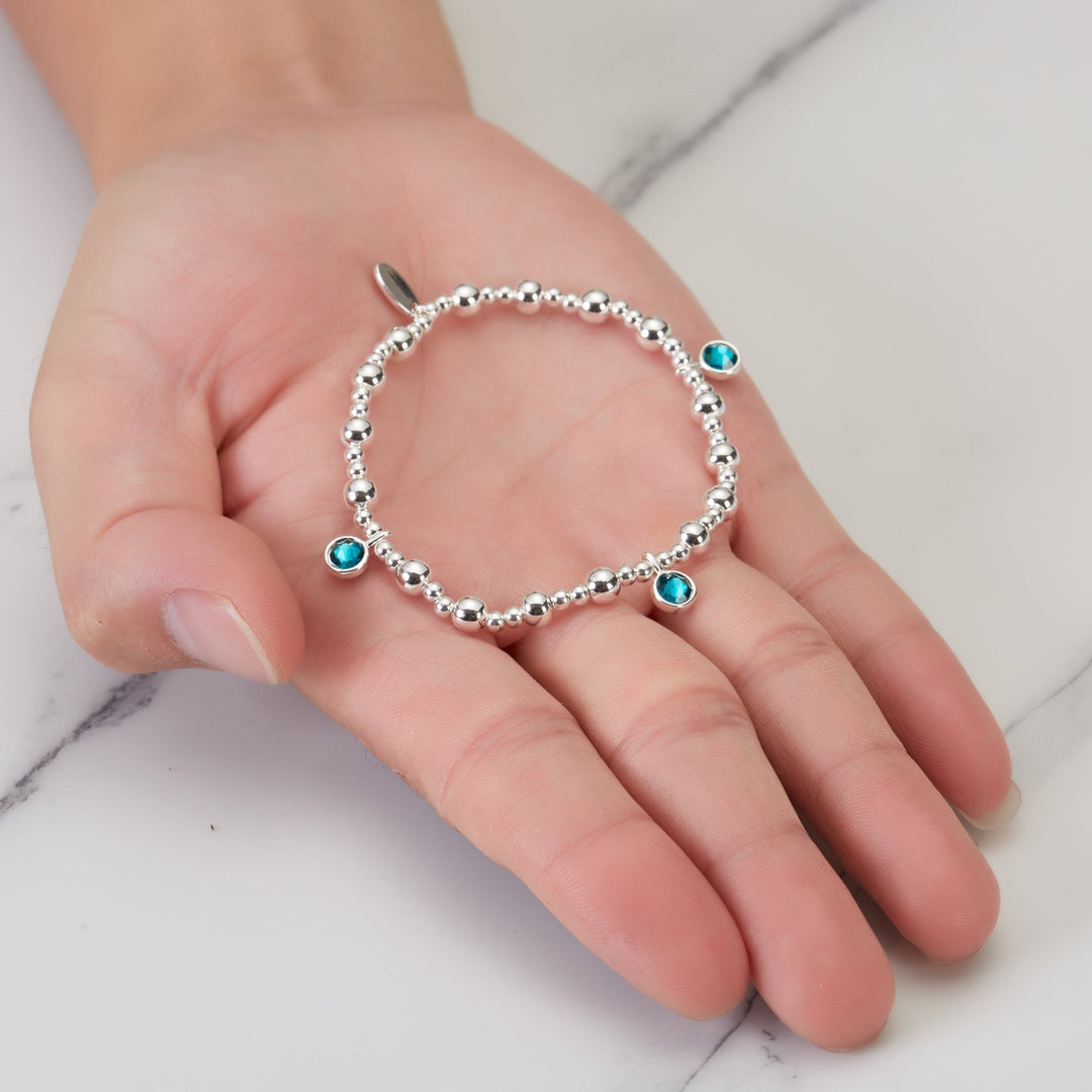 December (Blue Topaz) Birthstone Stretch Charm Bracelet with Quote Gift Box - Philip Jones Jewellery