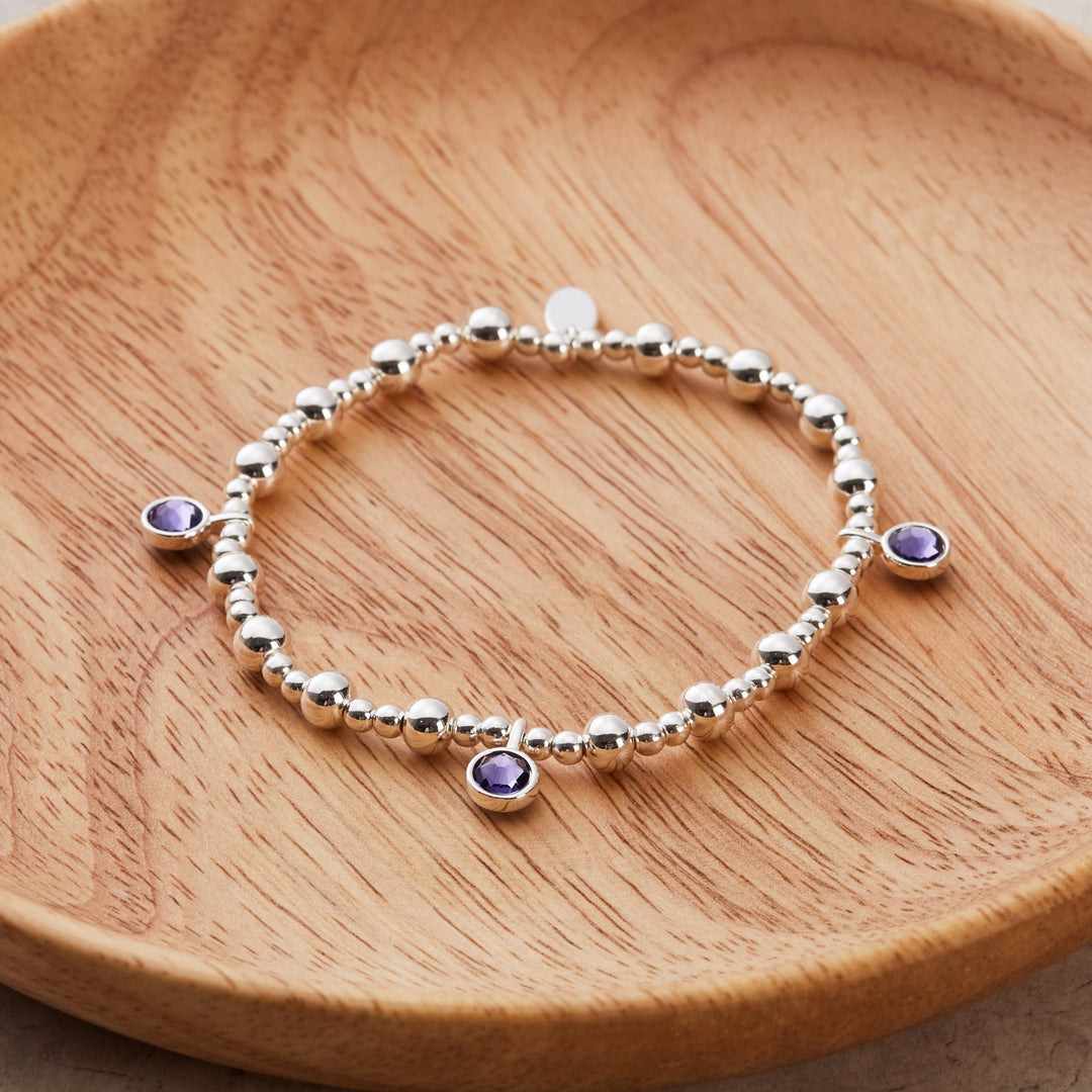 February (Amethyst) Birthstone Stretch Charm Bracelet with Quote Gift Box - Philip Jones Jewellery