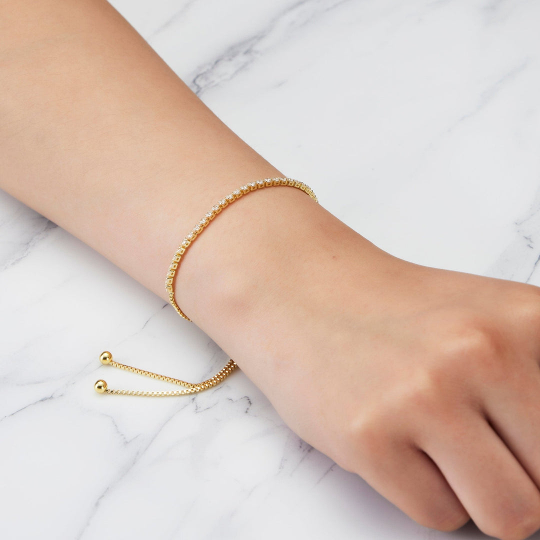 Gold Plated 2mm Adjustable Tennis Bracelet Created with Zircondia® Crystals - Philip Jones Jewellery