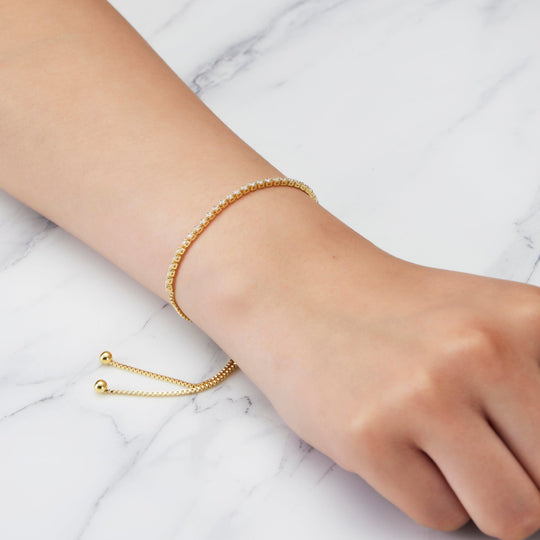 Gold Plated 2mm Adjustable Tennis Bracelet Created with Zircondia® Crystals - Philip Jones Jewellery