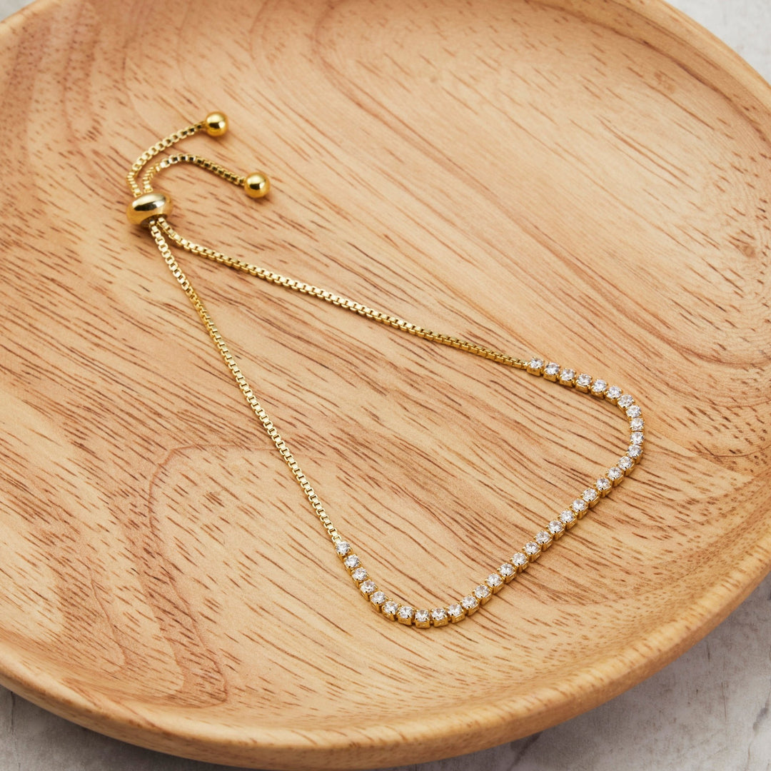 Gold Plated 2mm Adjustable Tennis Bracelet Created with Zircondia® Crystals - Philip Jones Jewellery