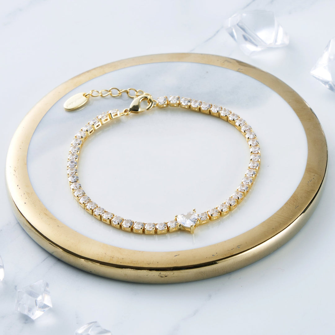 Gold Plated Heart Solitaire Tennis Bracelet Created with Zircondia® Crystals - Philip Jones Jewellery