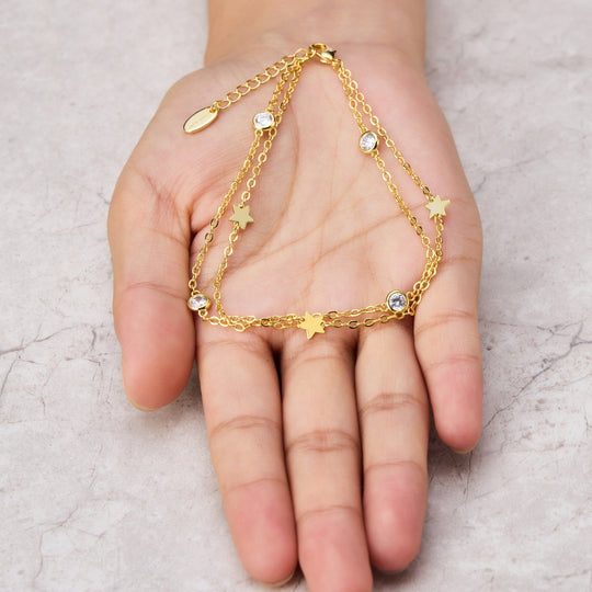 Gold Plated Layered Star Anklet Created with Zircondia® Crystals - Philip Jones Jewellery