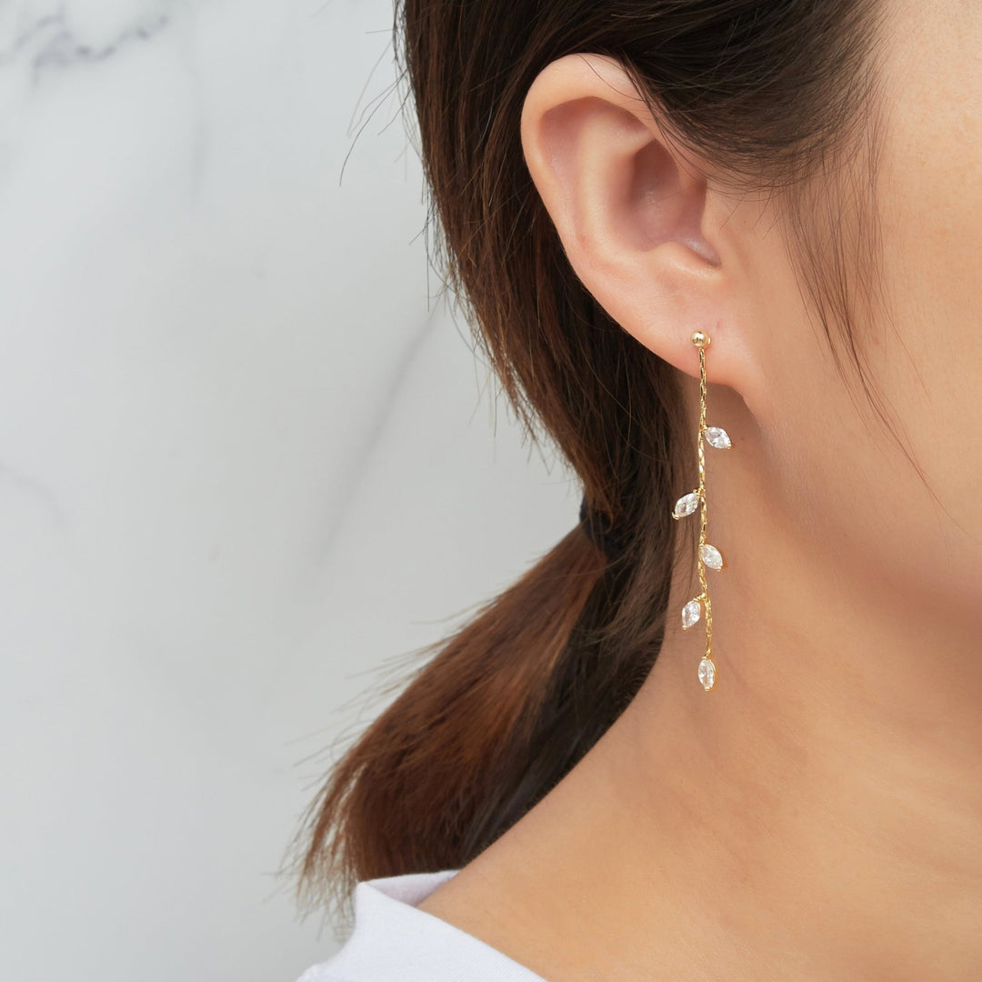 Gold Plated Leaf Dangle Earrings Created with Zircondia® Crystals - Philip Jones Jewellery