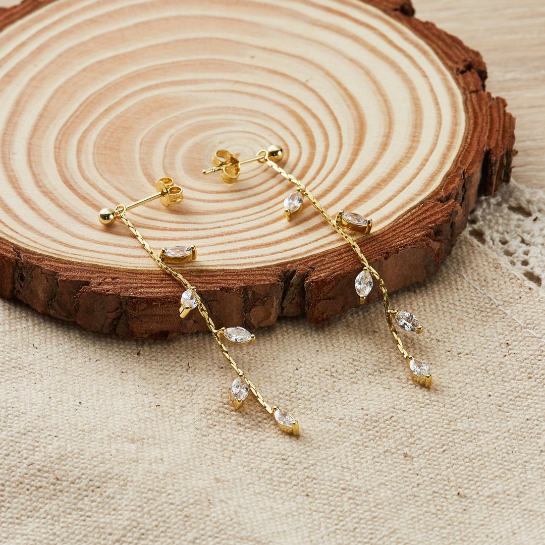 Gold Plated Leaf Dangle Earrings Created with Zircondia® Crystals - Philip Jones Jewellery