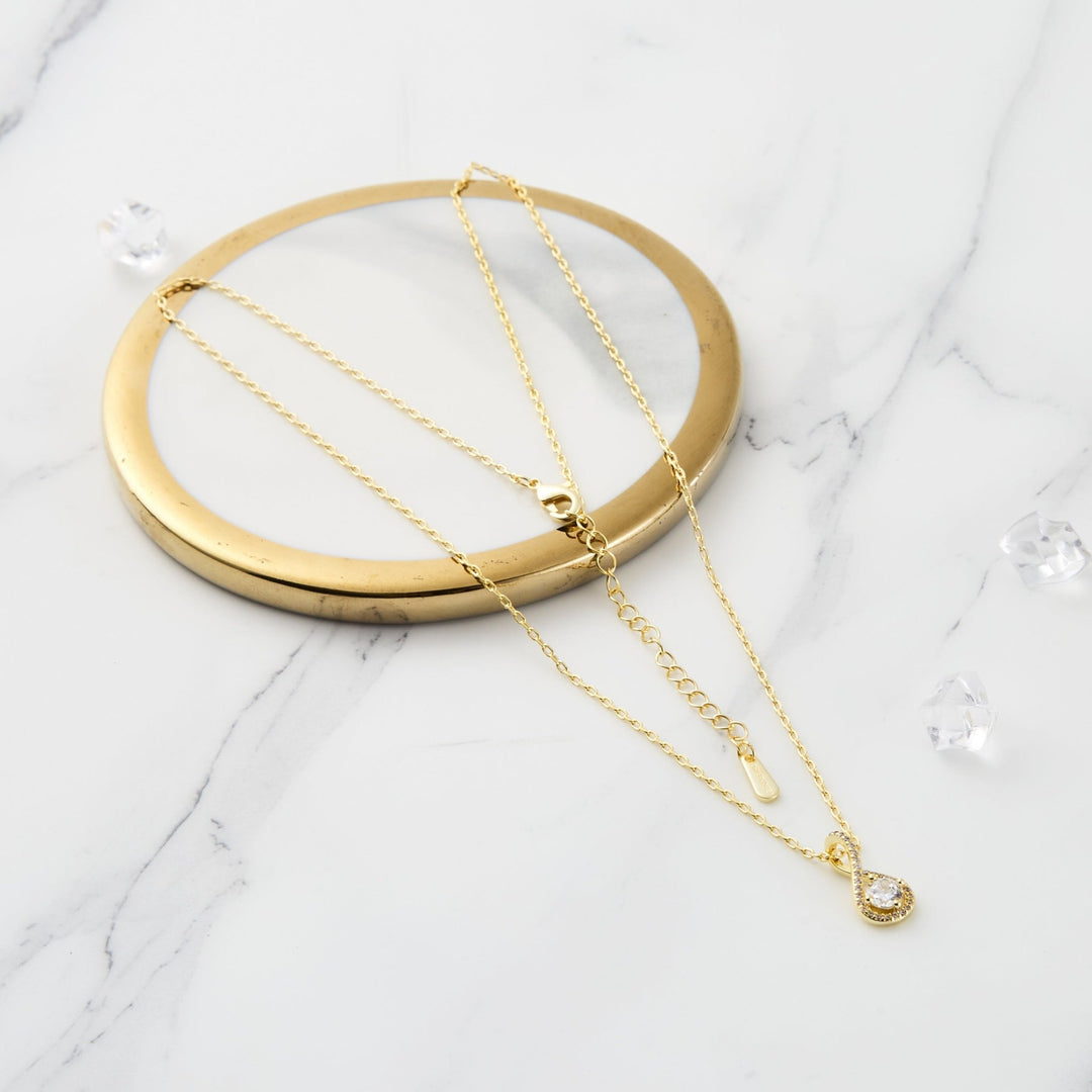 Gold Plated Solitaire Twist Necklace Created with Zircondia® Crystals - Philip Jones Jewellery