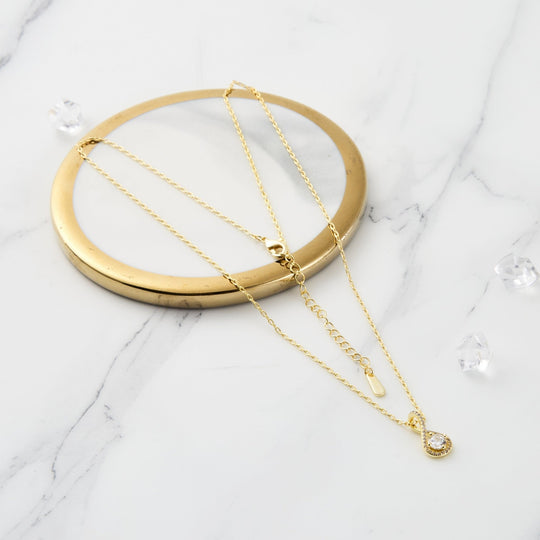 Gold Plated Solitaire Twist Necklace Created with Zircondia® Crystals - Philip Jones Jewellery
