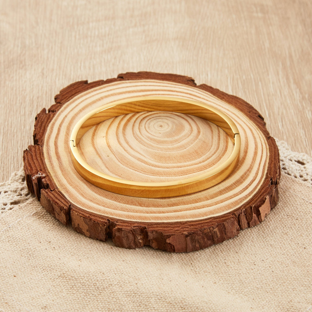 Gold Plated Stainless Steel Polished Bangle (7 Inch) - Philip Jones Jewellery