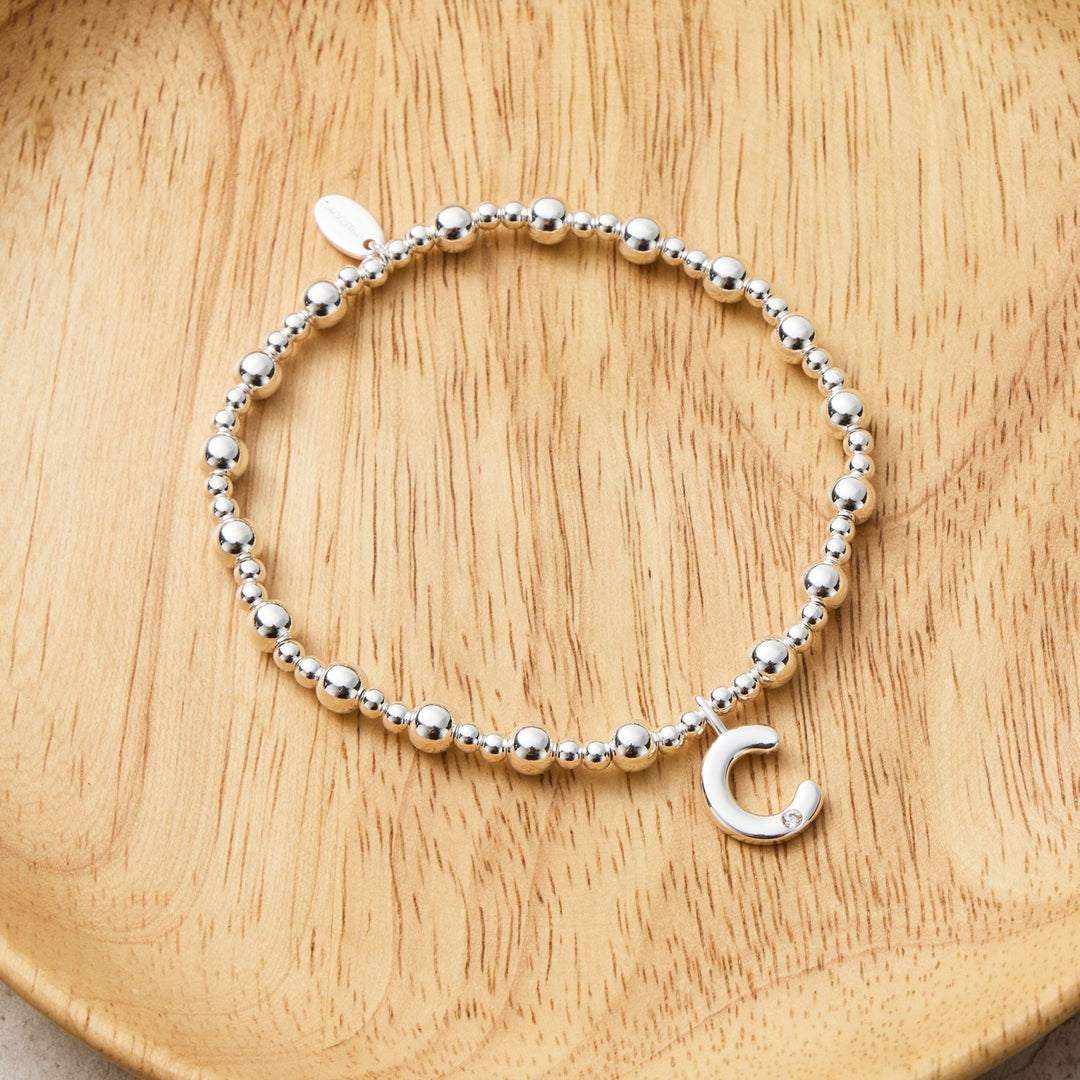 Letter C Initial Stretch Bracelet Created with Zircondia® Crystals - Philip Jones Jewellery