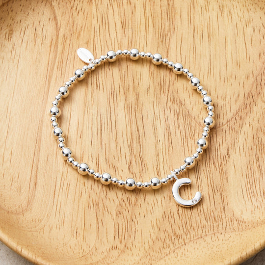 Letter C Initial Stretch Bracelet Created with Zircondia® Crystals - Philip Jones Jewellery