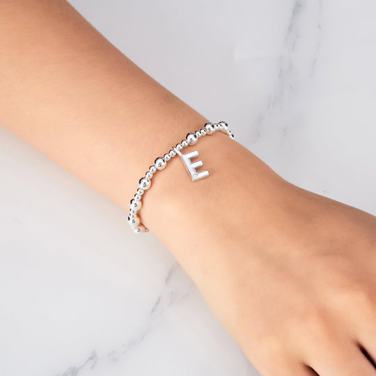 Letter E Initial Stretch Bracelet Created with Zircondia® Crystals - Philip Jones Jewellery