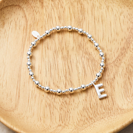 Letter E Initial Stretch Bracelet Created with Zircondia® Crystals - Philip Jones Jewellery