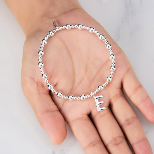 Letter E Initial Stretch Bracelet Created with Zircondia® Crystals - Philip Jones Jewellery