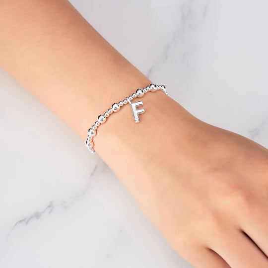 Letter F Initial Stretch Bracelet Created with Zircondia® Crystals - Philip Jones Jewellery