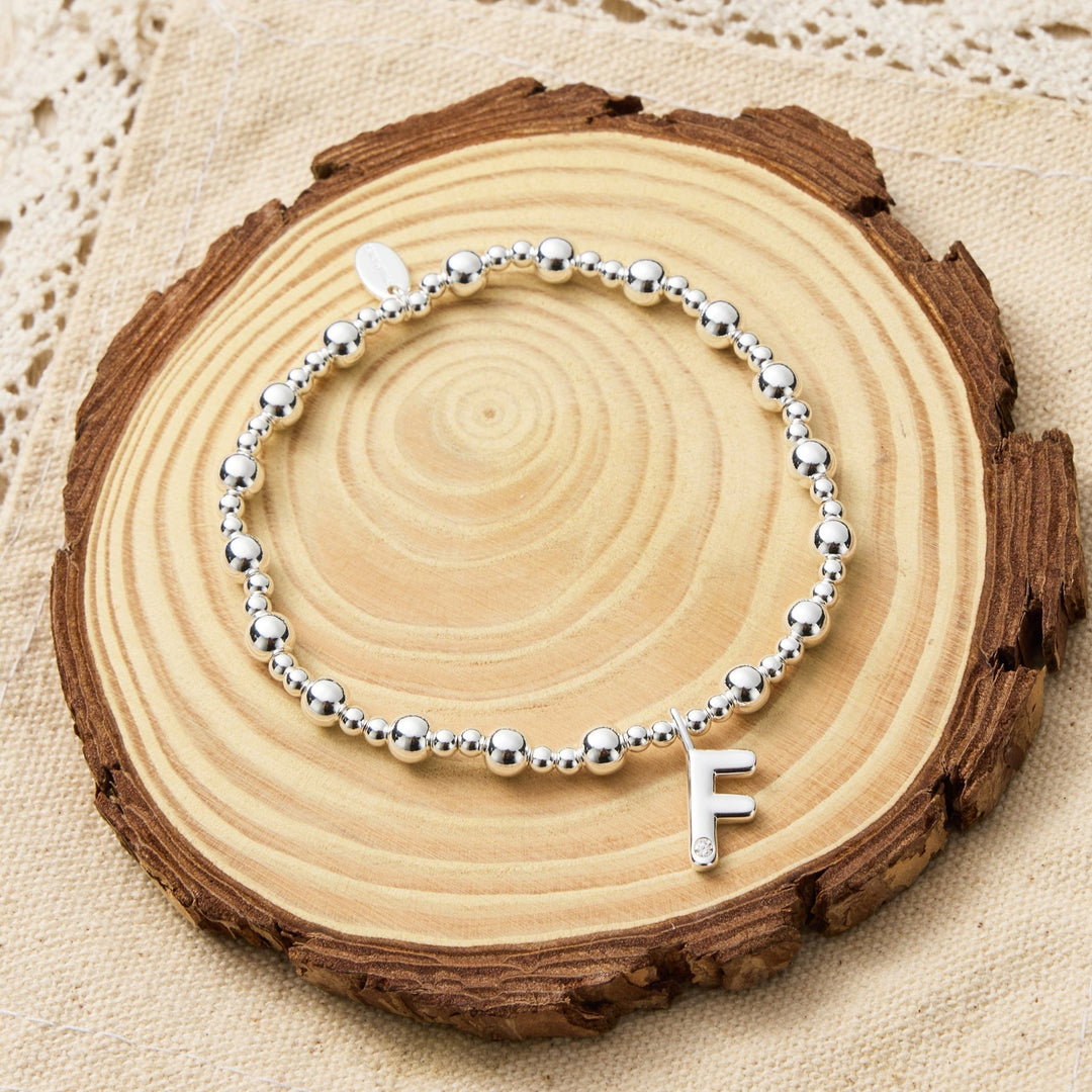 Letter F Initial Stretch Bracelet Created with Zircondia® Crystals - Philip Jones Jewellery