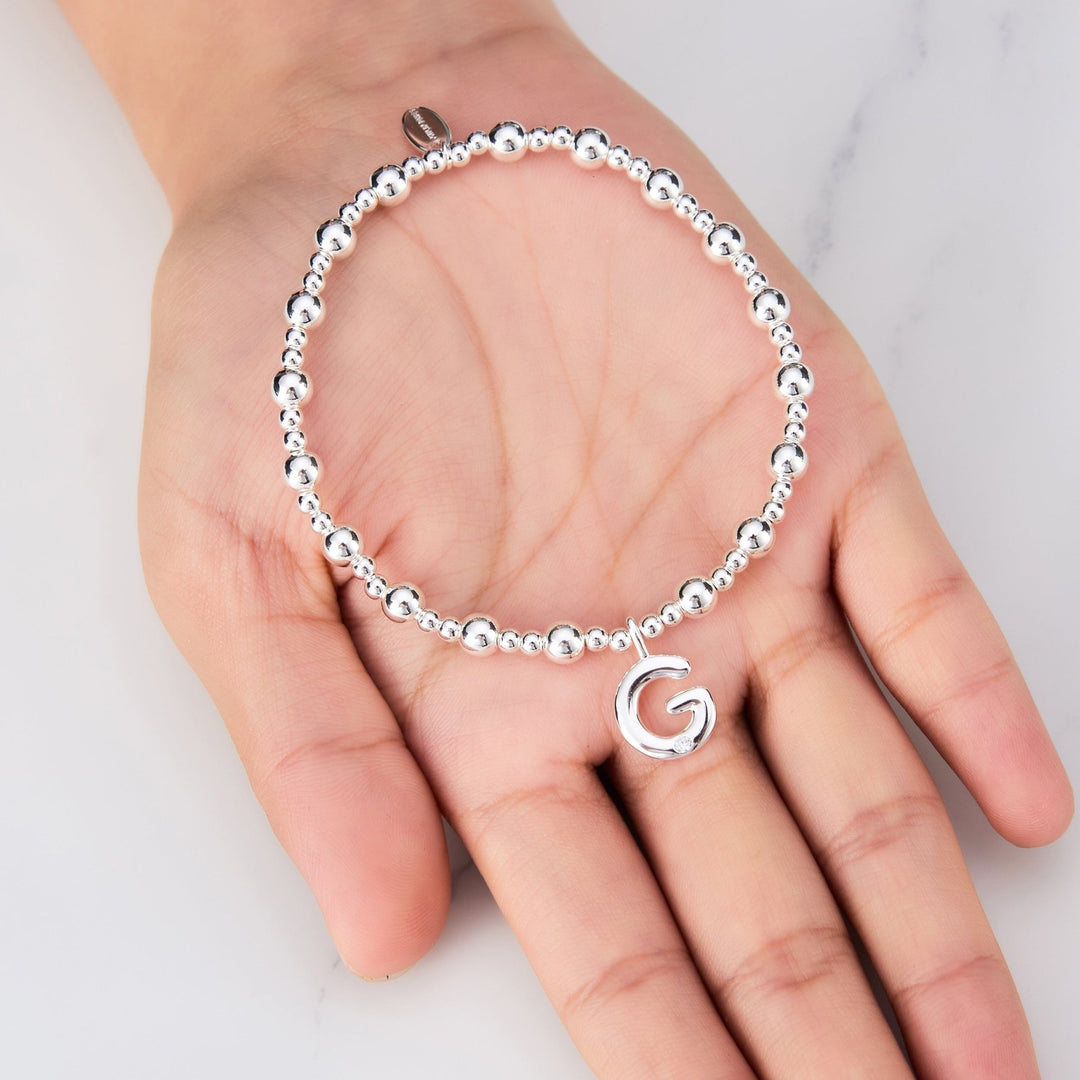 Letter G Initial Stretch Bracelet Created with Zircondia® Crystals - Philip Jones Jewellery