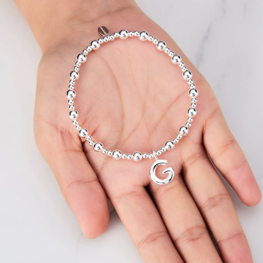 Letter G Initial Stretch Bracelet Created with Zircondia® Crystals - Philip Jones Jewellery
