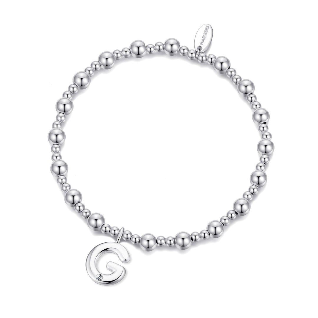 Letter G Initial Stretch Bracelet Created with Zircondia® Crystals - Philip Jones Jewellery