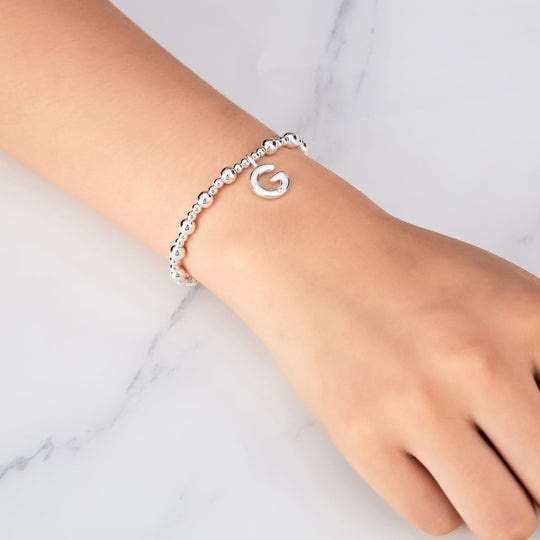 Letter G Initial Stretch Bracelet Created with Zircondia® Crystals - Philip Jones Jewellery