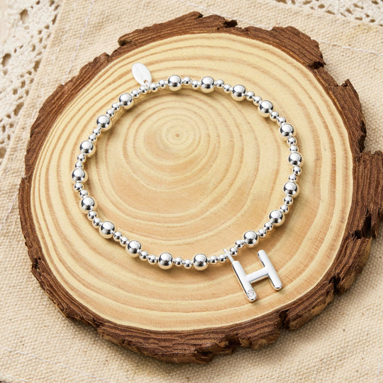 Letter H Initial Stretch Bracelet Created with Zircondia® Crystals - Philip Jones Jewellery