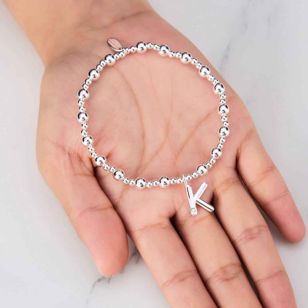 Letter K Initial Stretch Bracelet Created with Zircondia® Crystals - Philip Jones Jewellery