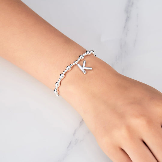 Letter K Initial Stretch Bracelet Created with Zircondia® Crystals - Philip Jones Jewellery
