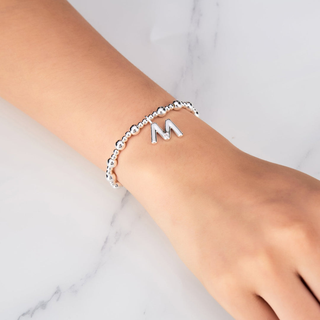 Letter M Initial Stretch Bracelet Created with Zircondia® Crystals - Philip Jones Jewellery