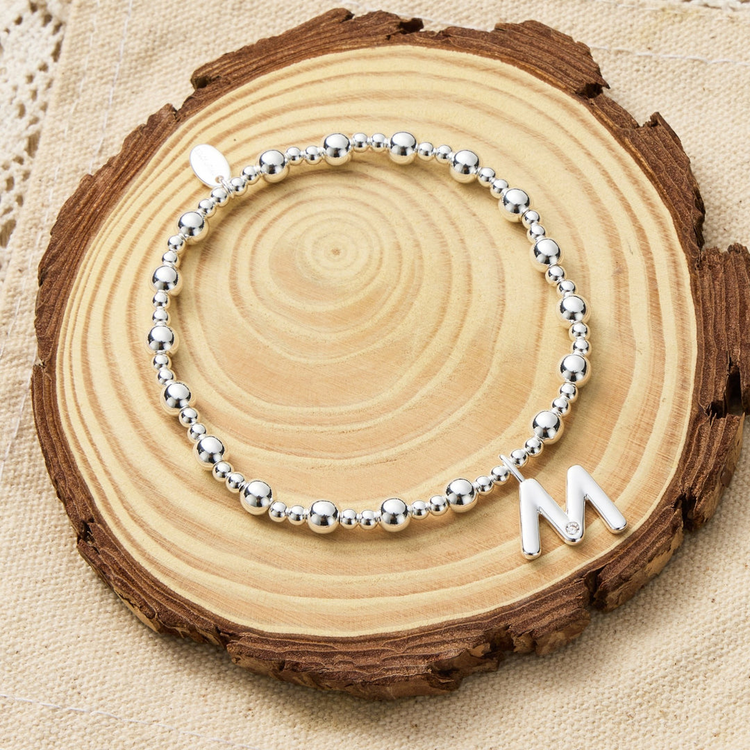 Letter M Initial Stretch Bracelet Created with Zircondia® Crystals - Philip Jones Jewellery