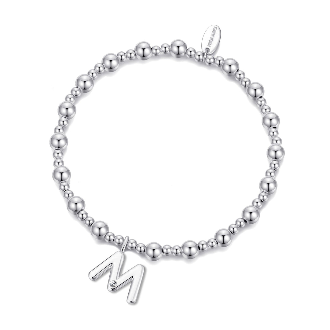 Letter M Initial Stretch Bracelet Created with Zircondia® Crystals - Philip Jones Jewellery