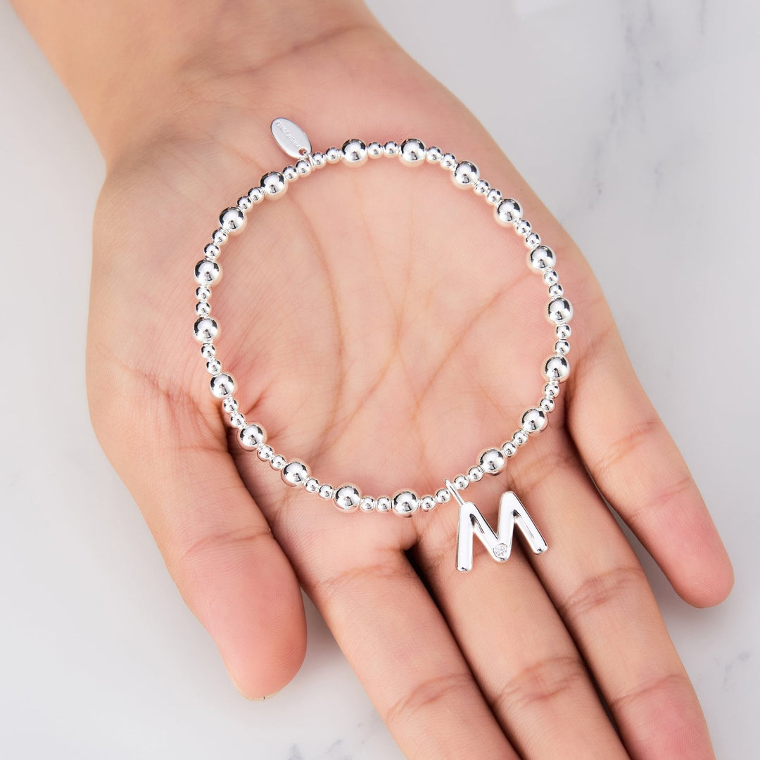 Letter M Initial Stretch Bracelet Created with Zircondia® Crystals - Philip Jones Jewellery