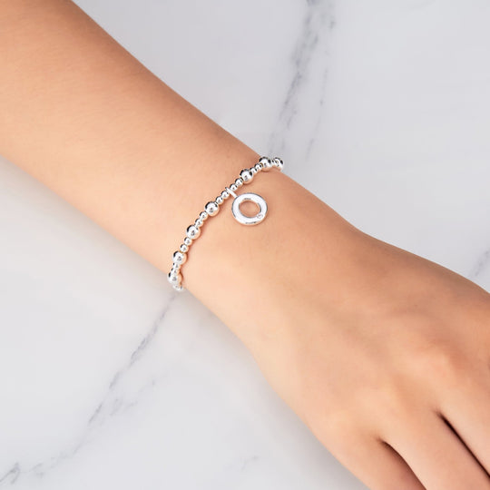 Letter O Initial Stretch Bracelet Created with Zircondia® Crystals - Philip Jones Jewellery