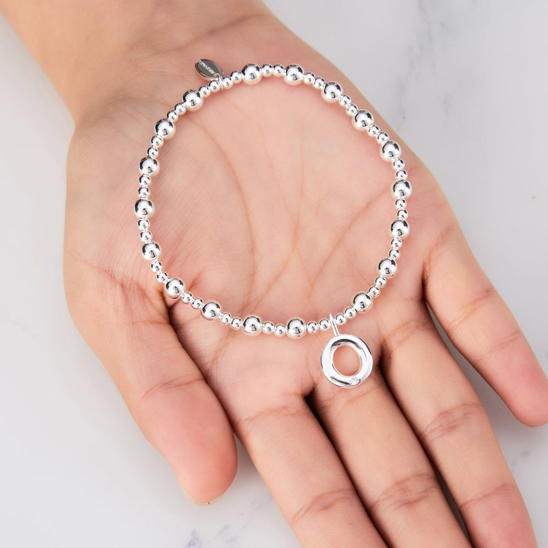 Letter O Initial Stretch Bracelet Created with Zircondia® Crystals - Philip Jones Jewellery