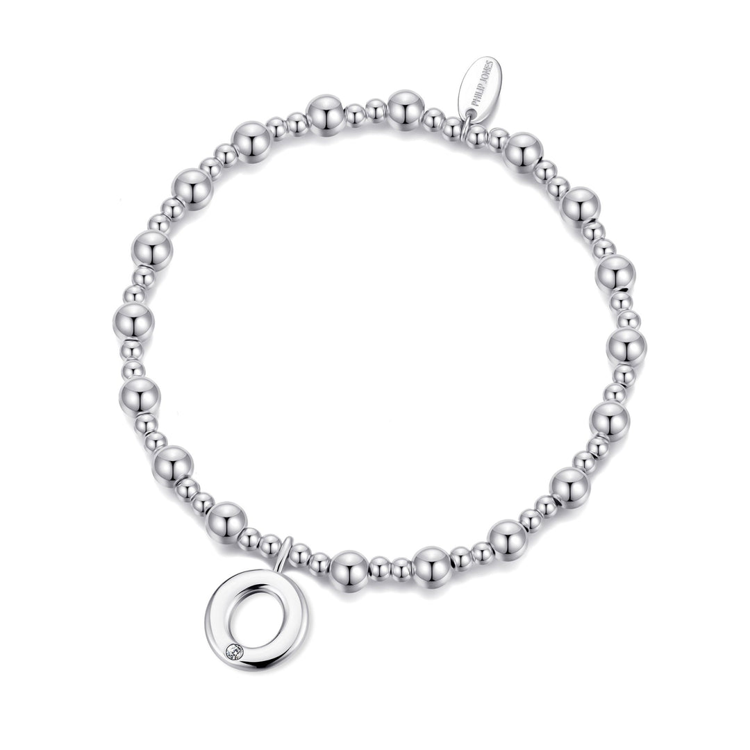 Letter O Initial Stretch Bracelet Created with Zircondia® Crystals - Philip Jones Jewellery