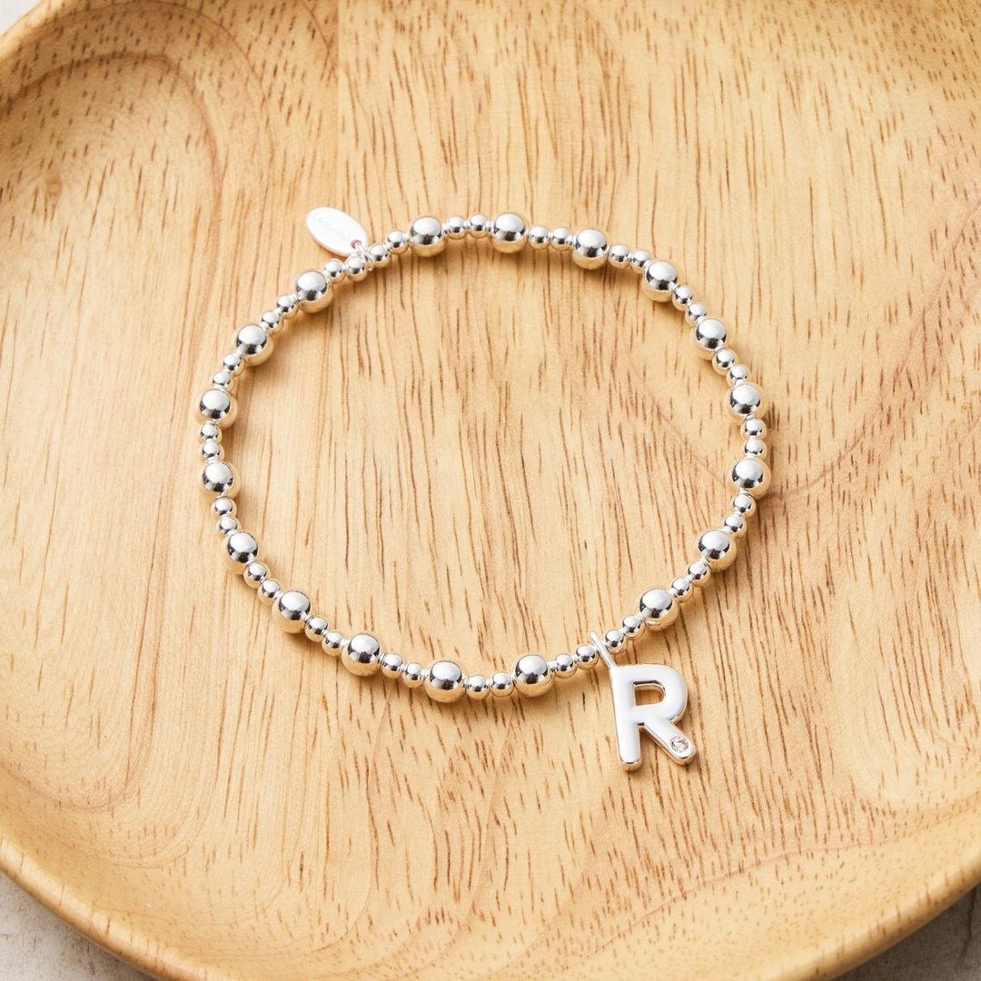 Letter R Initial Stretch Bracelet Created with Zircondia® Crystals - Philip Jones Jewellery