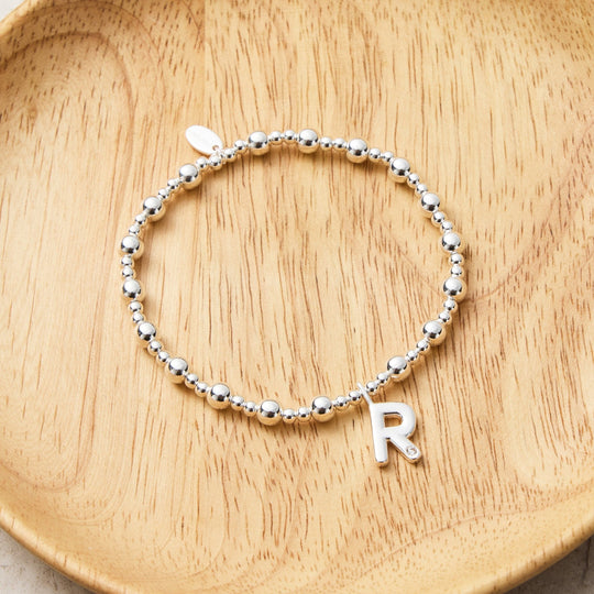 Letter R Initial Stretch Bracelet Created with Zircondia® Crystals - Philip Jones Jewellery