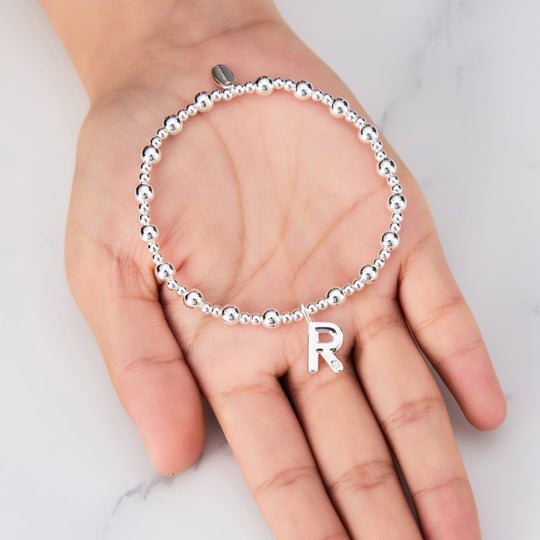 Letter R Initial Stretch Bracelet Created with Zircondia® Crystals - Philip Jones Jewellery