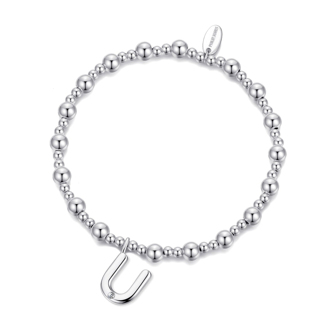Letter U Initial Stretch Bracelet Created with Zircondia® Crystals - Philip Jones Jewellery
