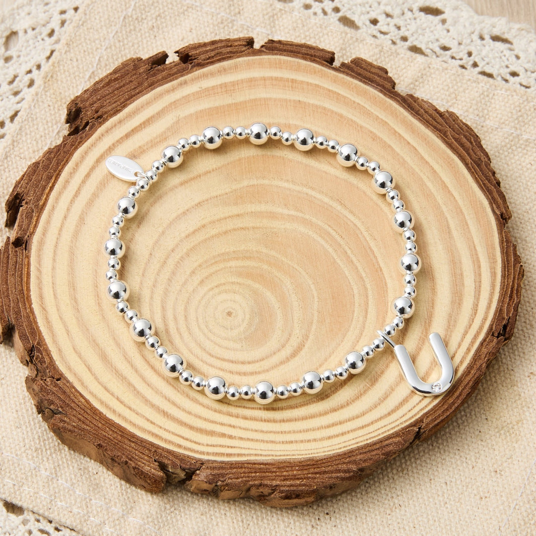 Letter U Initial Stretch Bracelet Created with Zircondia® Crystals - Philip Jones Jewellery