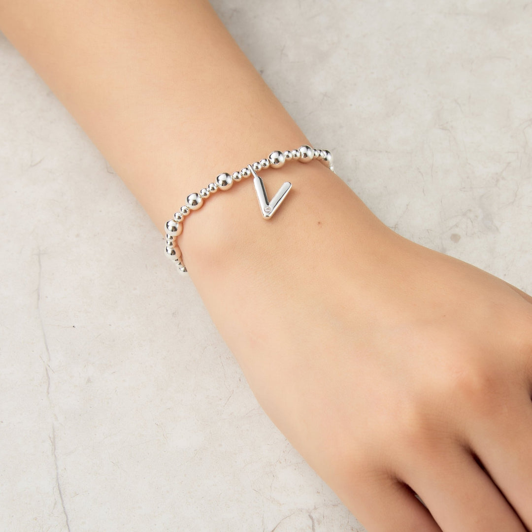 Letter V Initial Stretch Bracelet Created with Zircondia® Crystals - Philip Jones Jewellery