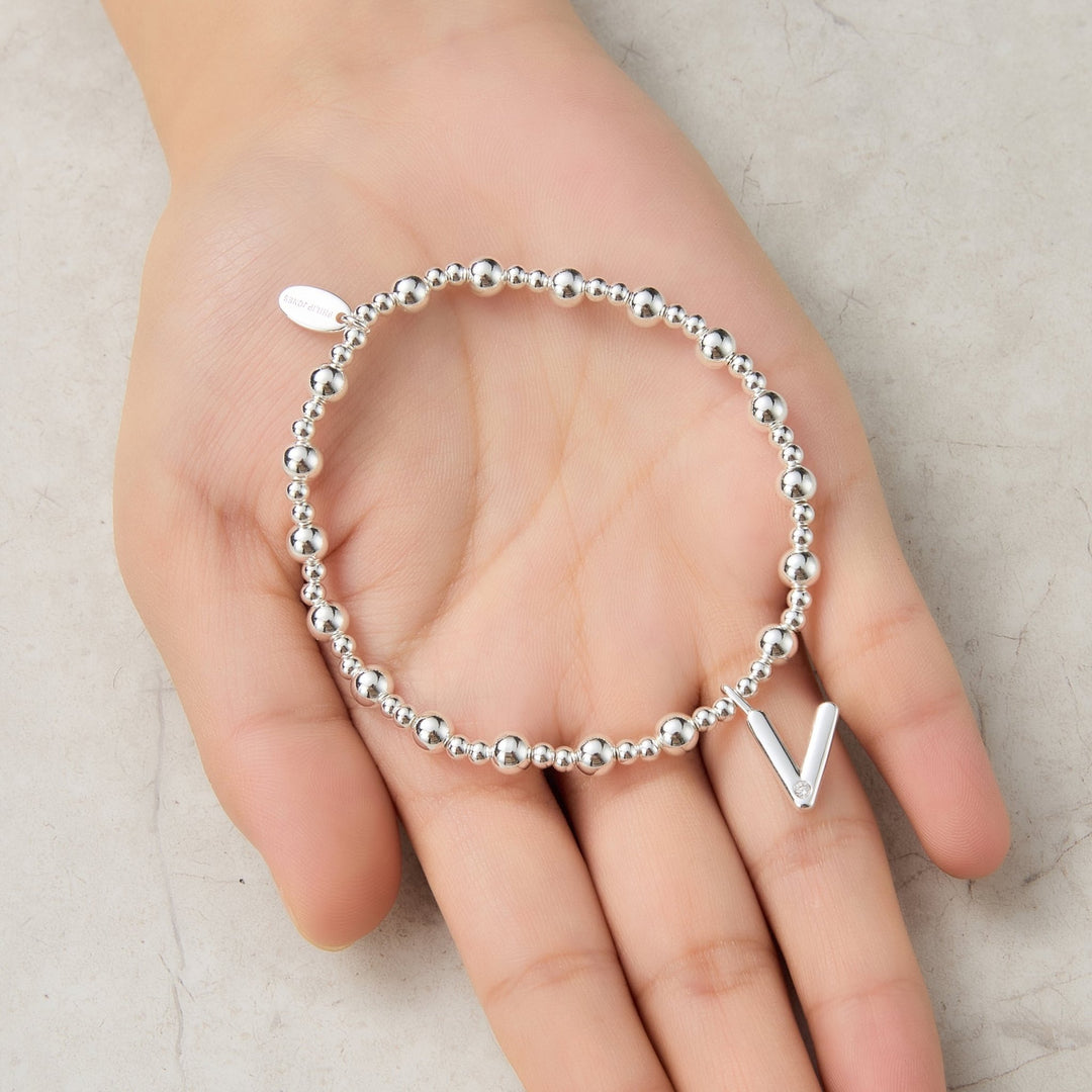 Letter V Initial Stretch Bracelet Created with Zircondia® Crystals - Philip Jones Jewellery