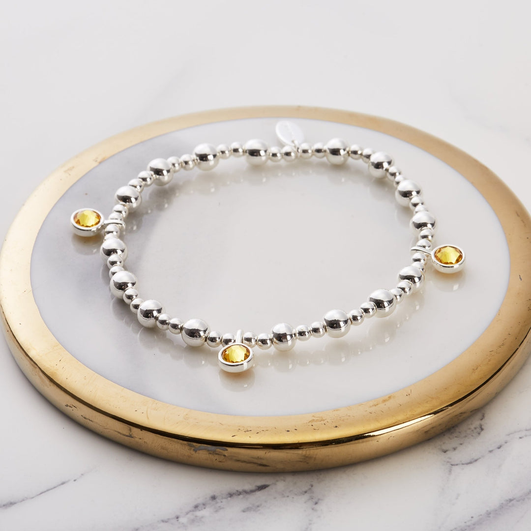 November (Citrine) Birthstone Stretch Charm Bracelet with Quote Gift Box - Philip Jones Jewellery