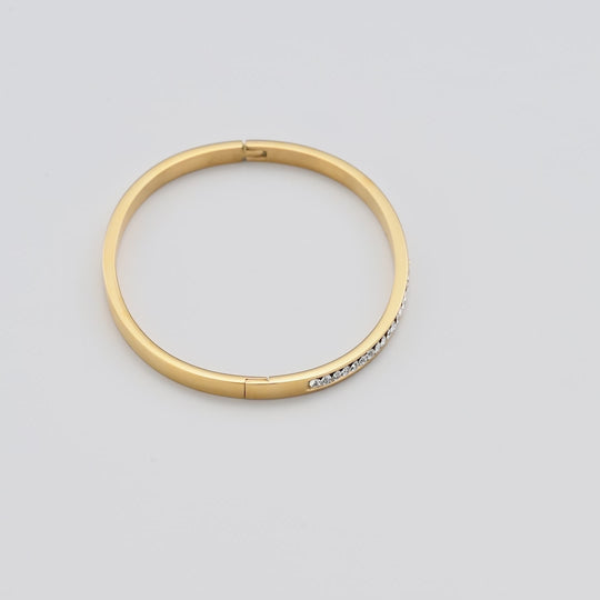 Gold Plated Channel Set Bangle Created with Zircondia® Crystals Video
