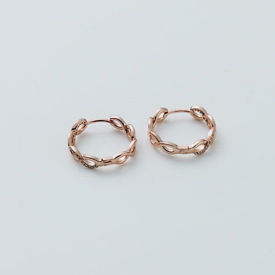 Rose Gold Plated Infinity Hoop Earrings Created with Zircondia® Crystals