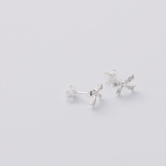 Silver Plated Bow Earrings Created with Zircondia® Crystals